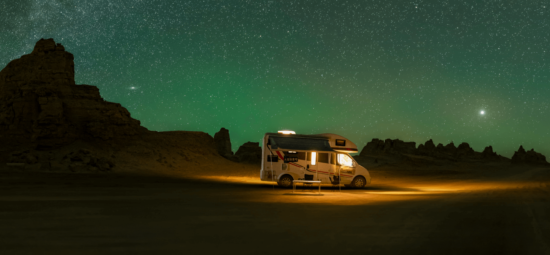 Motorhome under the starry sky.